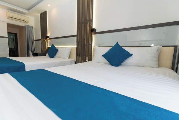 Familiekamer | Een bureau, gratis wifi, beddengoed