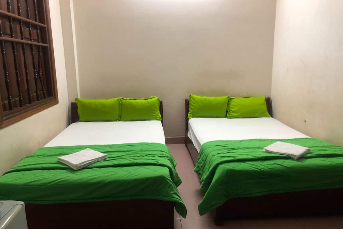 Habitación cuádruple superior | Wifi gratis y ropa de cama