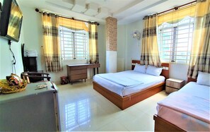 Perhehuone | Työpöytä, silitysrauta/-lauta, ilmainen Wi-Fi, vuodevaatteet