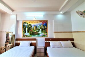 Chambre Triple Deluxe