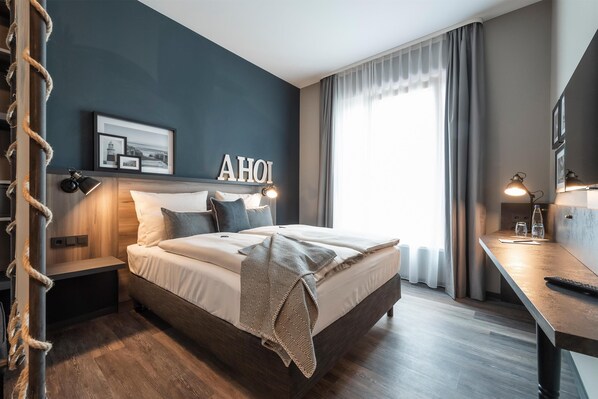 Coffre-fort, bureau, système d’insonorisation, fer et planche à repasser