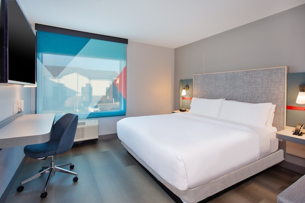 Desk, laptop workspace, free WiFi, bed sheets