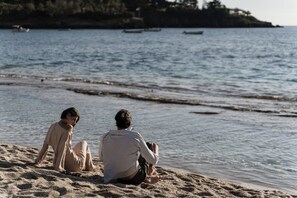 On the beach, white sand