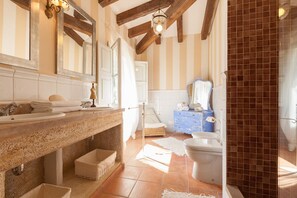 Bathtub, hair dryer, towels