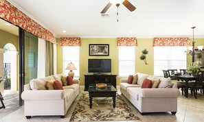 Téléviseur, jeux vidéo, table de baby-foot