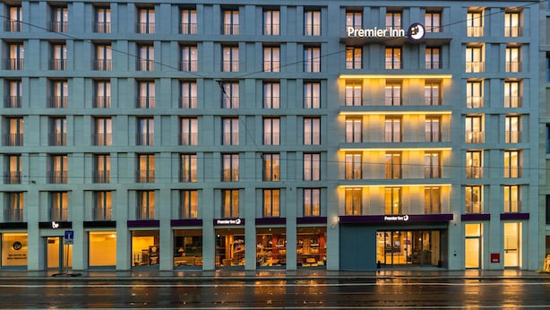 A multi-story hotel with a prominent 'Premier Inn' sign, large windows, and a clean facade. - Premier Inn Leipzig City Oper (Leipzig)