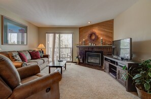 Flat-screen TV, fireplace, DVD player