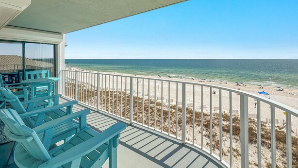 A balcony with a view of the beach and ocean. - INCREDIABLE WEST END CAP VIEW, NICE PROPERTY, GREAT FOR FAMILIES! (Orange Beach)