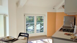 Apartment | Private kitchen | Espresso maker, full-size fridge, oven, stovetop - Appartamento Adriana (Baveno)