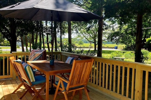 Dinning on new deck with a great view of the cranberry bog with gorgeous sunsets