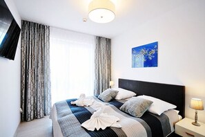 Departamento | 1 habitación, tabla de planchar con plancha, wifi gratis y ropa de cama 