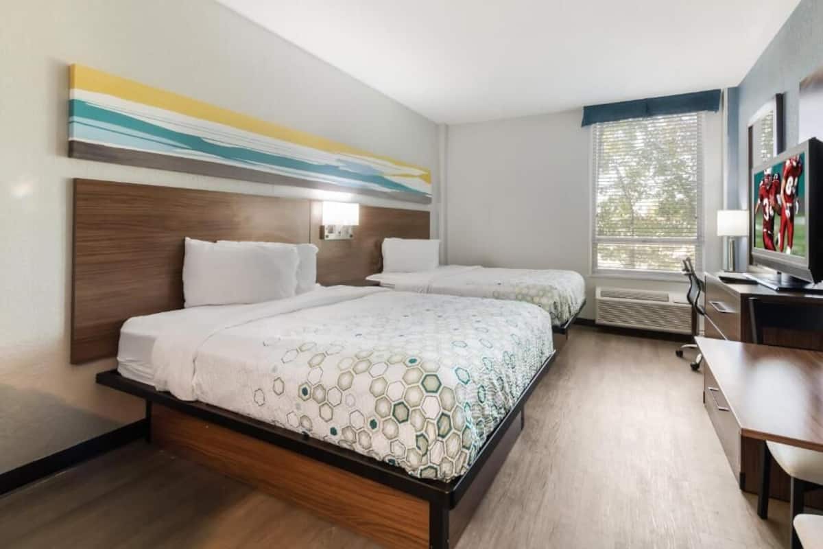 Desk, laptop workspace, blackout curtains, free WiFi