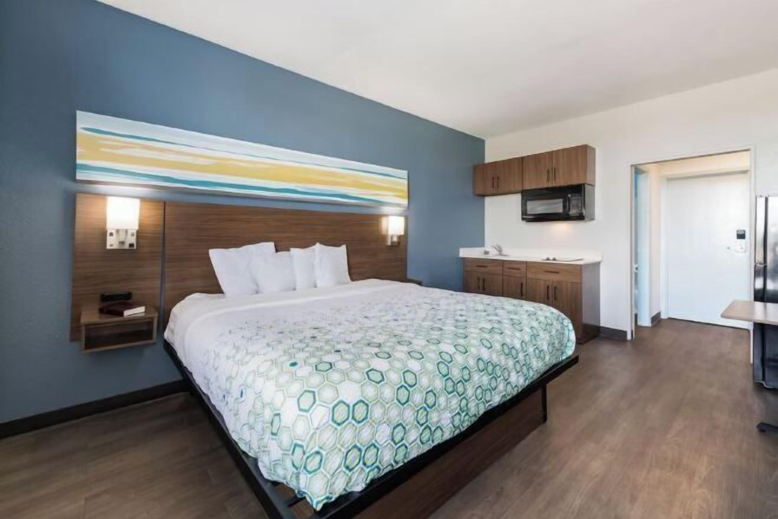 Desk, laptop workspace, blackout curtains, free WiFi