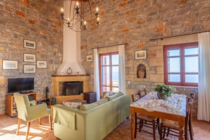 LCD TV, fireplace, DVD player, books - ISMINI, Luxury Stone Villa in Stoupa with Private Pool, BBQ and Amazing Sea View (Neochori, Stoupa)