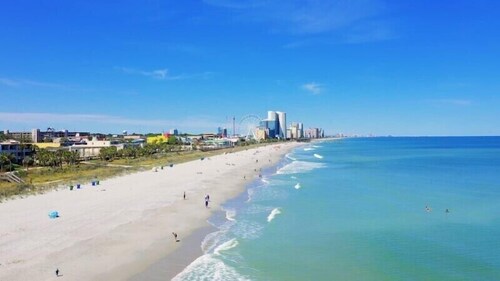 Location, Location.. On the Course & a 5 minute ride to the BEACH!