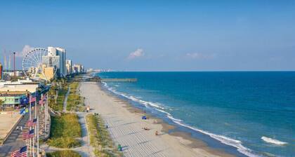 Location, Location.. On the Course & a 5 minute ride to the BEACH!