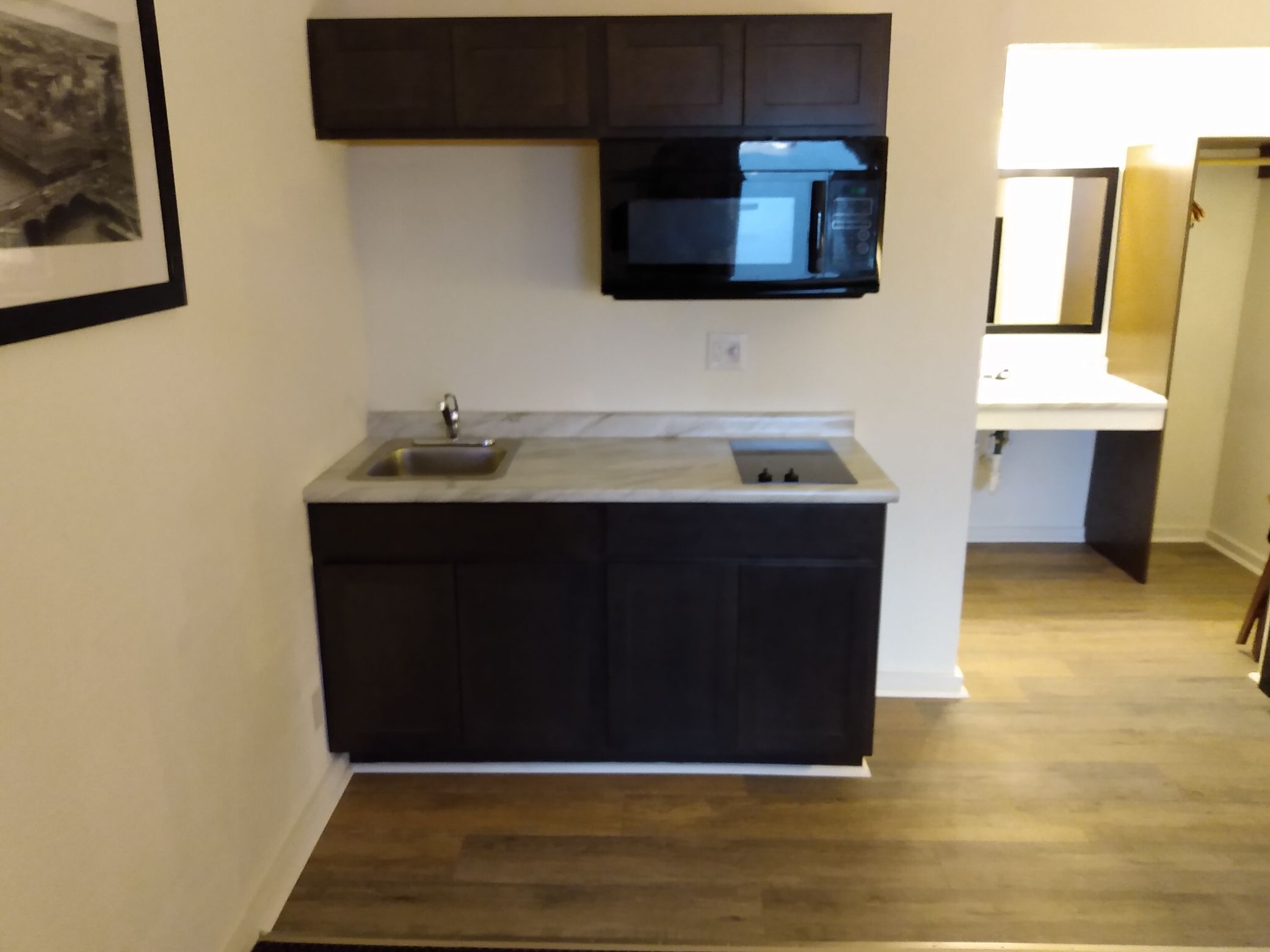 Fridge, microwave, coffee/tea maker, toaster