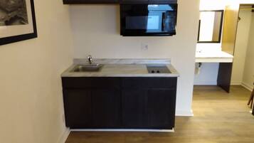 Fridge, microwave, coffee/tea maker, toaster