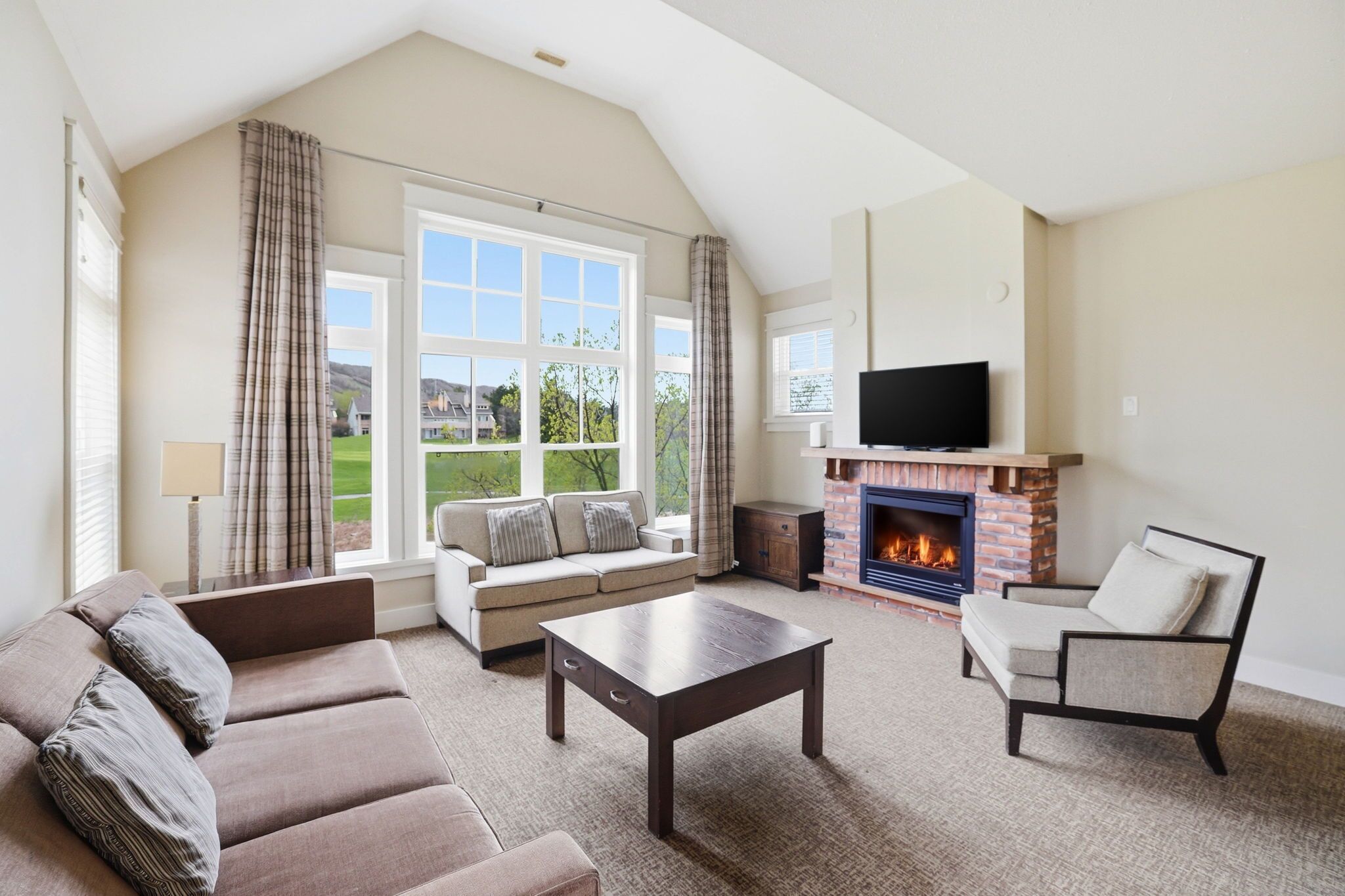 Premier Condo, Mountain View | Living area | 40-inch Smart TV with cable channels, TV, streaming services