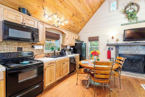 Microwave, dishwasher, coffee/tea maker, cookware/dishes/utensils