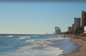 On the beach, sun-loungers, beach towels