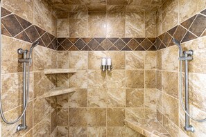Bathtub, hair dryer, towels, soap