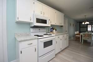 Fridge, microwave, oven, stovetop - Stunning Fenced Home | Pool (Heated Opt) & Hot Tub (Palm Coast)