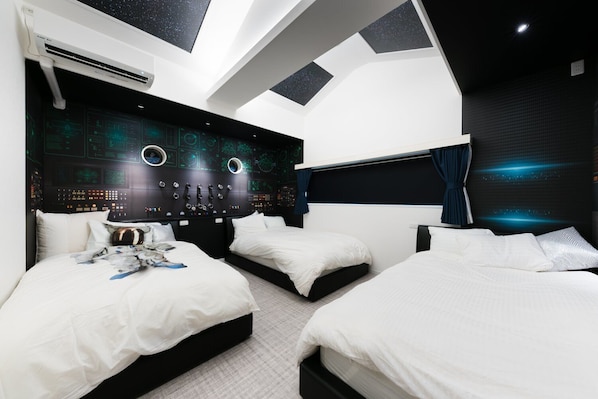 Experience a high-tech retreat with a large bed, two additional sleeping options, and a skylight.