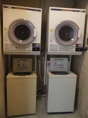 Convenient laundry facilities offer two washing machines and two dryers for guest use.