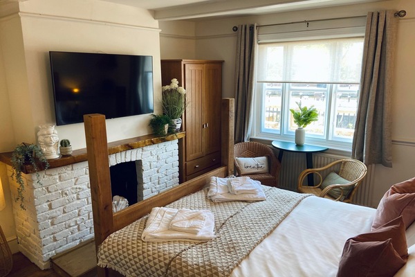 Family Room (Waterfront suite) | Iron/ironing board, individually furnished, bed sheets