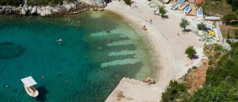 Beach nearby, sun loungers