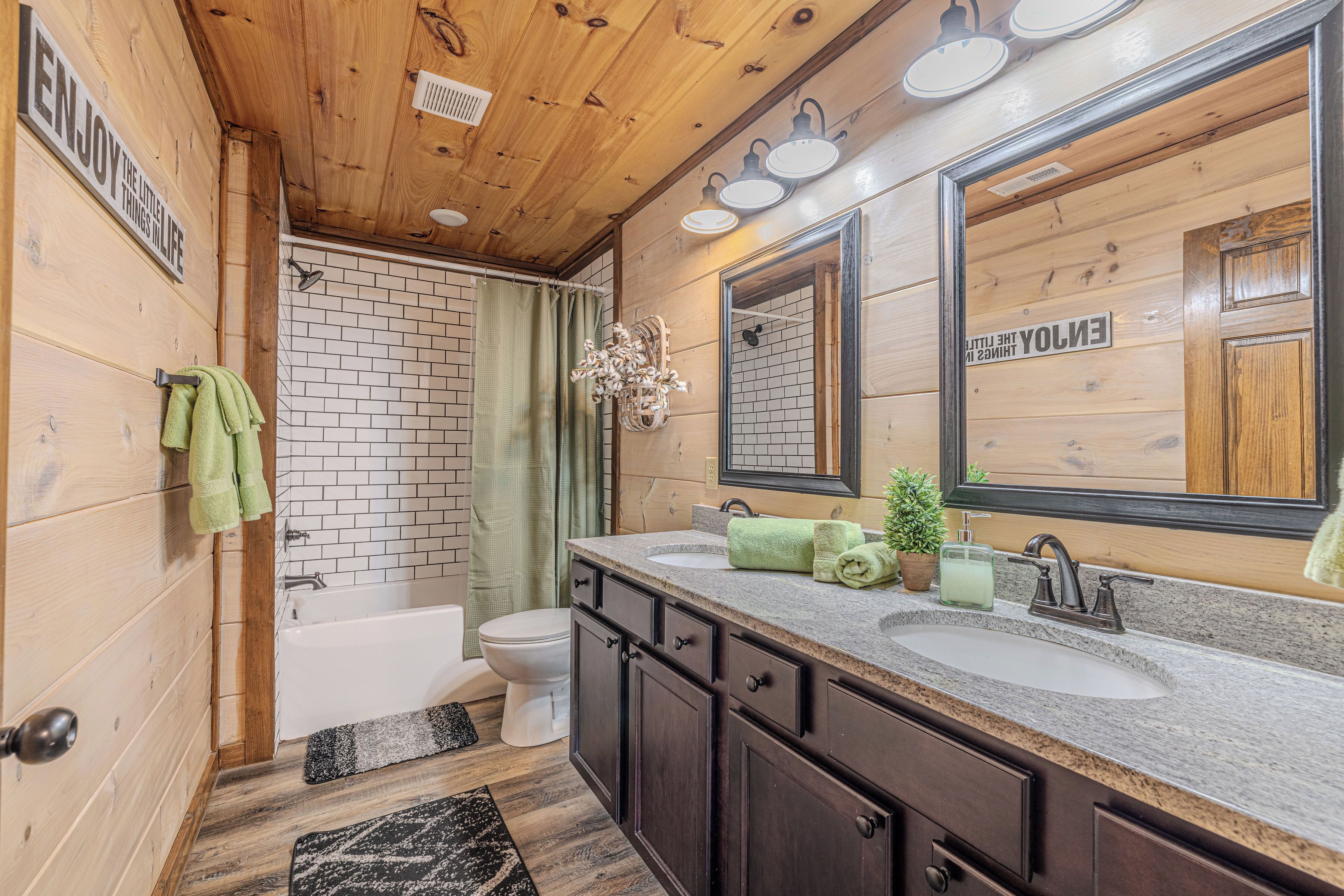 Combined shower/tub, hair dryer, towels, soap