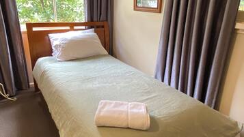 4 bedrooms, desk, iron/ironing board, travel cot