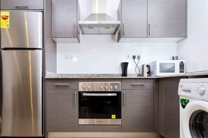 Apartment, 1 Schlafzimmer | Eigene Küche | Kühlschrank, Mikrowelle, Ofen, Herdplatte