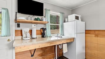 Fridge, microwave, stovetop, coffee/tea maker