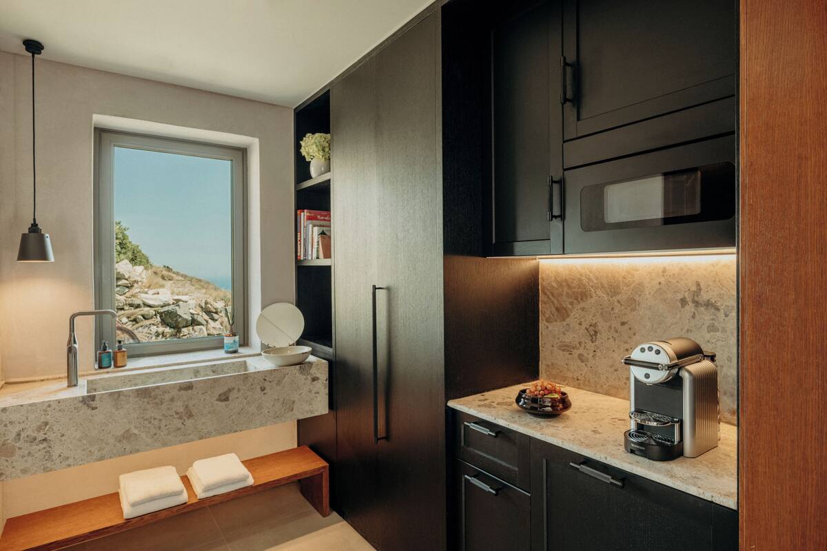 junior residence with private heated plunge pool and sea view | bathroom | shower, rainfall showerhead, designer toiletries, hair dryer