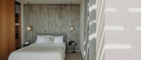 A modern bedroom with a large bed, wooden wardrobe, and a concrete wall.