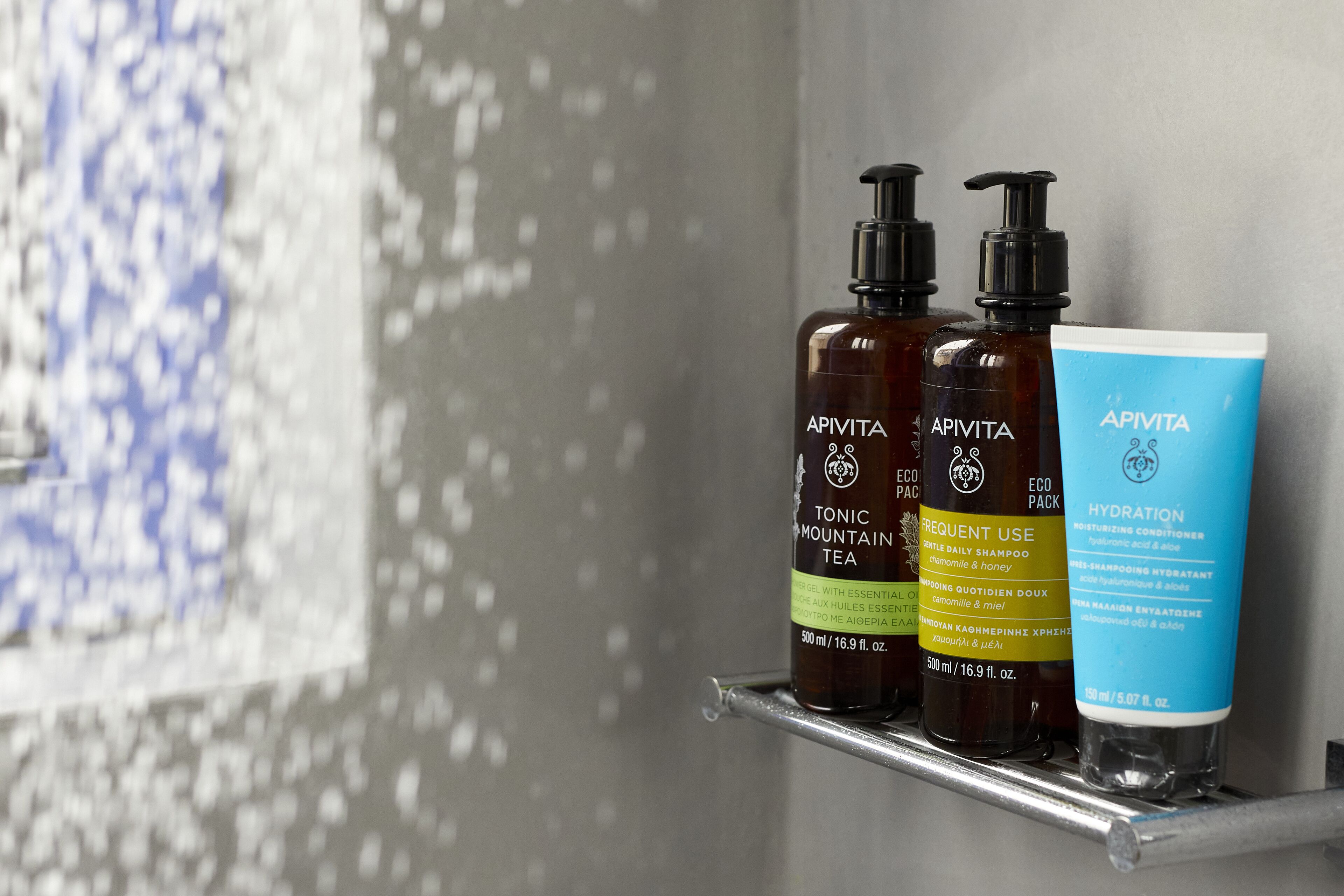 studio villa with hot tub and sea view, pyrgos village | bathroom amenities | shower, rainfall showerhead, designer toiletries, hair dryer