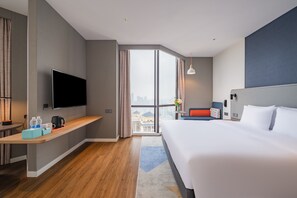Habitación estándar, 1 cama King size | Ropa de cama de alta calidad, edredón y minibar 