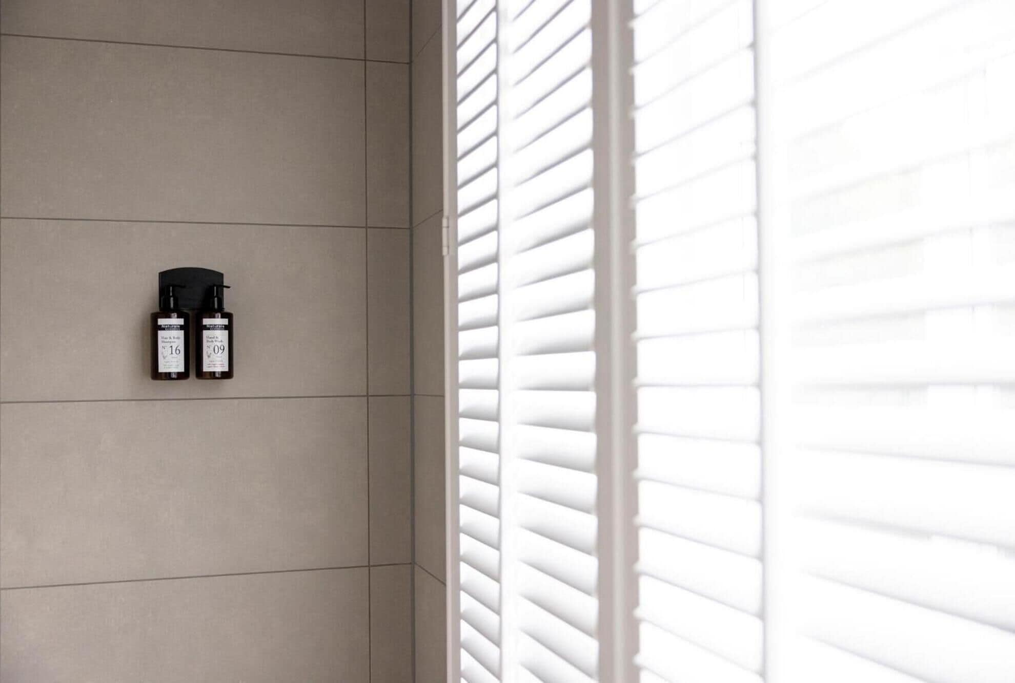 classic double room | bathroom | shower, rainfall showerhead, eco-friendly toiletries, towels