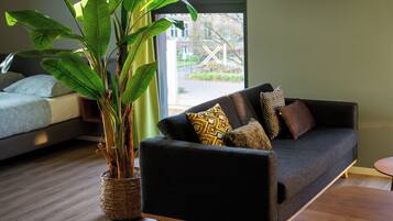 Deluxe Studio | Individually decorated, individually furnished, desk, laptop workspace