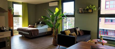 Deluxe Studio | Individually decorated, individually furnished, desk, laptop workspace