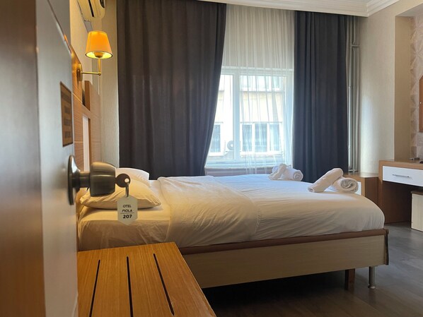 Economy Double or Twin Room, 1 Bedroom | Desk, laptop workspace, blackout curtains, iron/ironing board