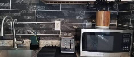 Micro-ondas, cooktop, cafeteira/chaleira