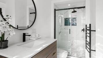 Combined shower/bathtub, soap, toilet paper
