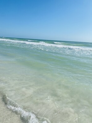 On the beach, sun-loungers, beach towels