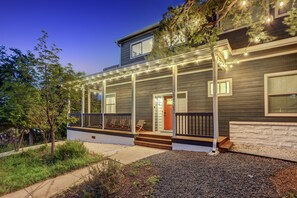 A modern two-story house with a covered porch, a front door, and a small front yard. - Bachelor/Bachelorette Mansion In the Heart of ATX (Austin)
