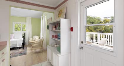 The Pink House Unit B: A Cozy Retreat Steps from the Beach