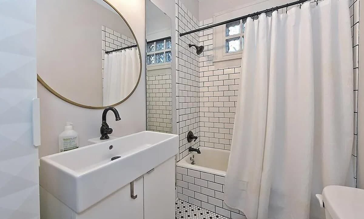 Bathtub, hair dryer, towels, soap