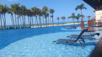 2 outdoor pools, free cabanas, pool umbrellas